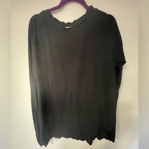 We The Free M Black Long Sleeve Top. Exposed seems and thumb holes.